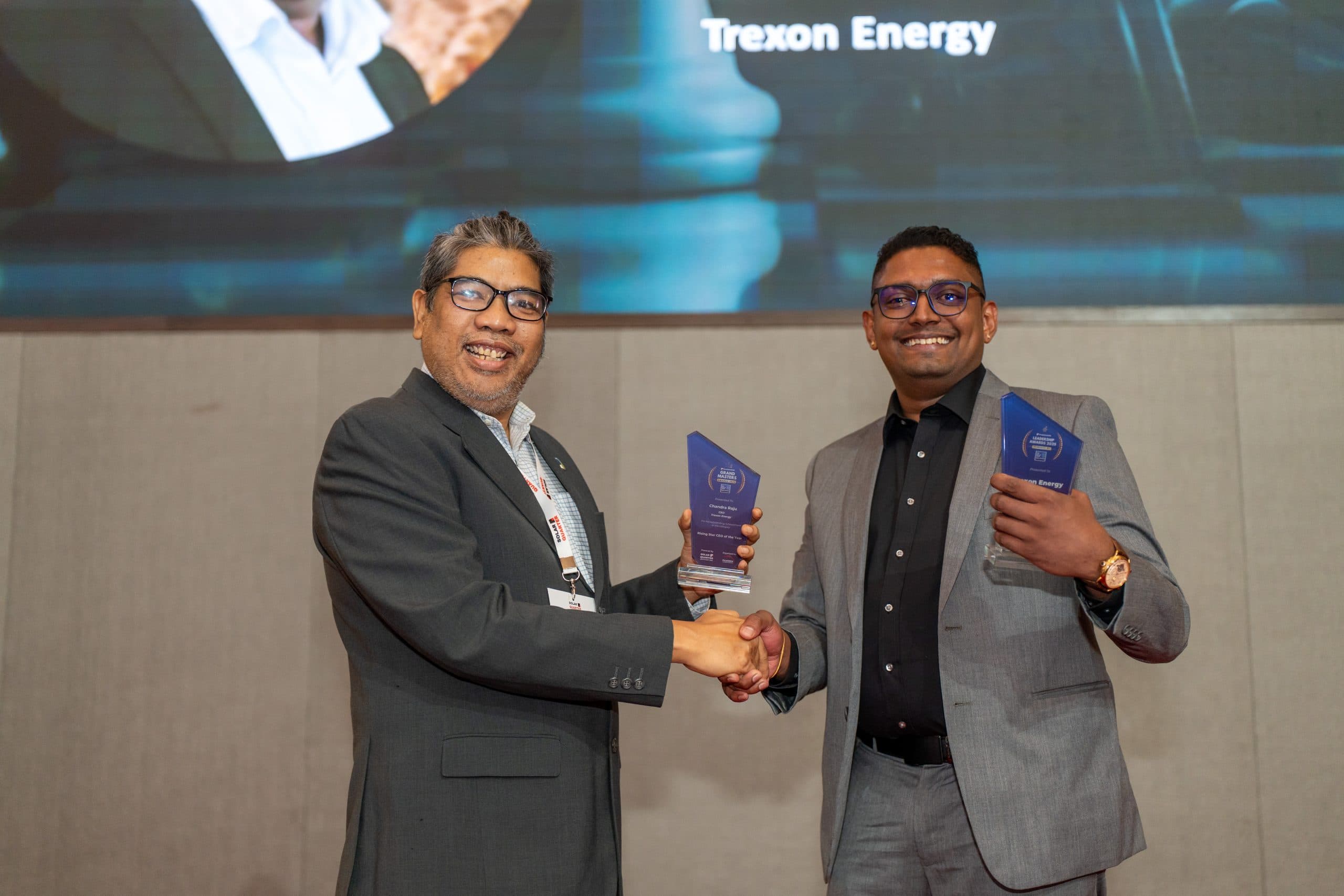 Trexon Energy team accepting Rising Star Solar Company of the Year award trophy at Solar Week Malaysia 2025 ceremony